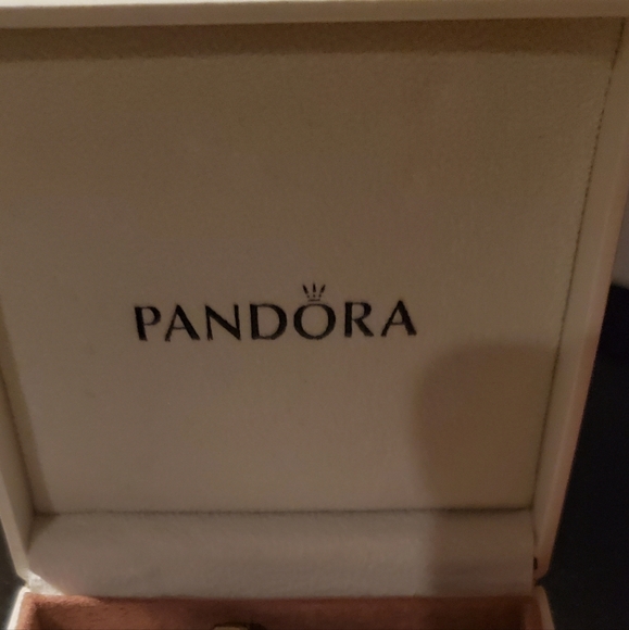 Like brand new pandora Leather nice bracelet 6 charms comes with it. - Picture 2 of 3